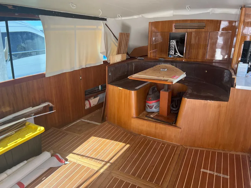 Slide: The Image of Interior of a 1997 Ocean Yachts 40 Super Sport with wooden flooring and cabinetry. - 22