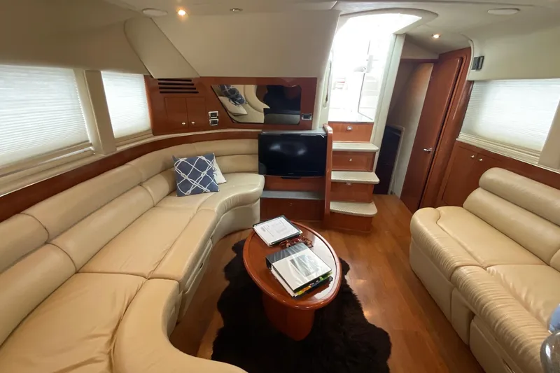 Slide: The Image of Luxurious interior of 2002 Sea Ray 480 Motor Yacht with plush seating and modern amenities. - 13
