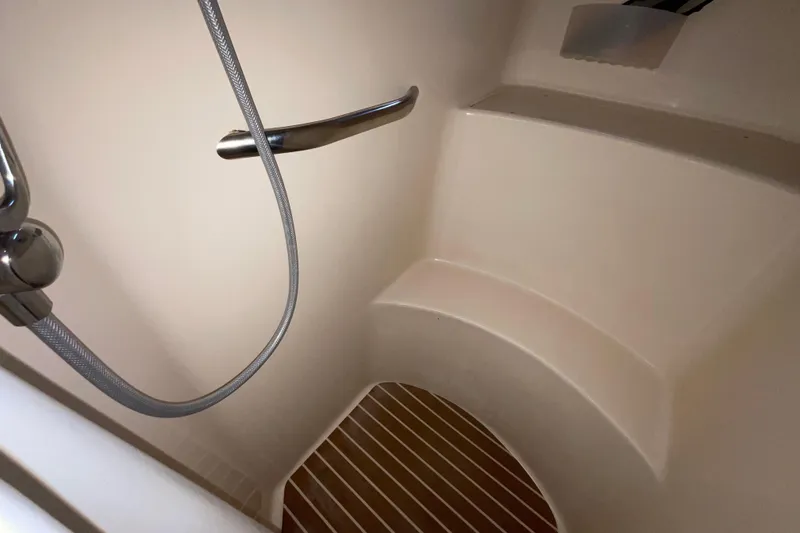 Slide: The Image of Shower area in 2002 Sea Ray 480 Motor Yacht with wooden flooring. - 33