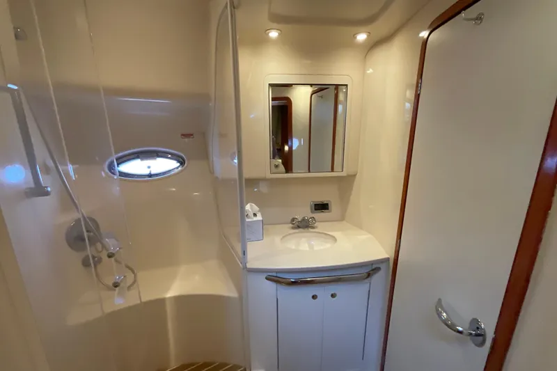Slide: The Image of Luxurious bathroom in 2002 Sea Ray 480 Motor Yacht with shower and vanity. - 35