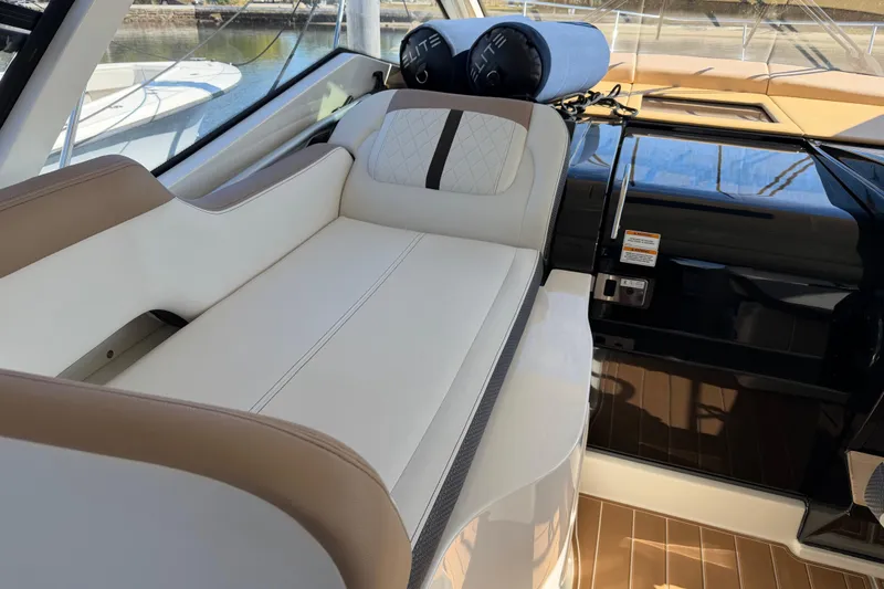 Slide: The Image of 2018 Sea Ray 350 Sundancer interior with luxurious seating and elegant design. - 41