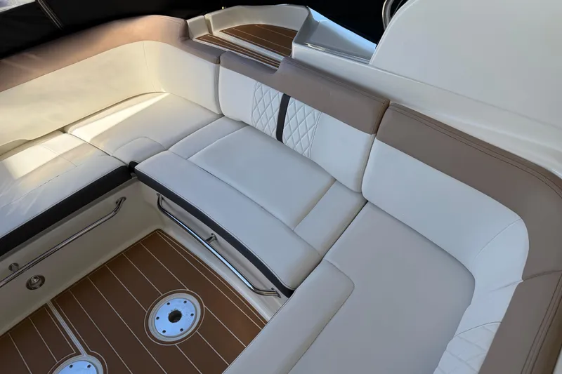 Slide: The Image of Luxurious seating area on 2018 Sea Ray 350 Sundancer boat, featuring elegant upholstery. - 42