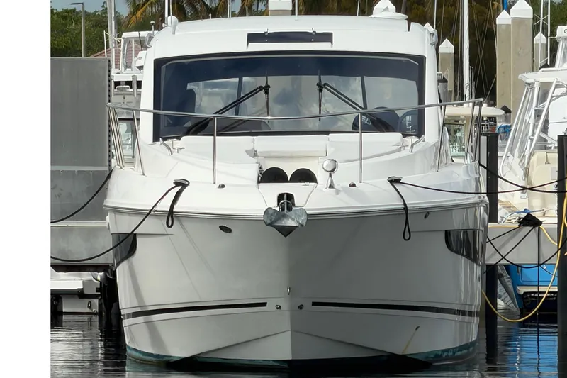 Slide: The Image of 2018 Sea Ray 350 Sundancer docked at marina. - 45