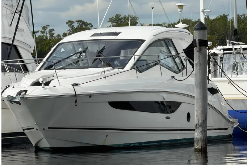 Slide: The Image of 2018 Sea Ray 350 Sundancer yacht docked at harbor. - 46