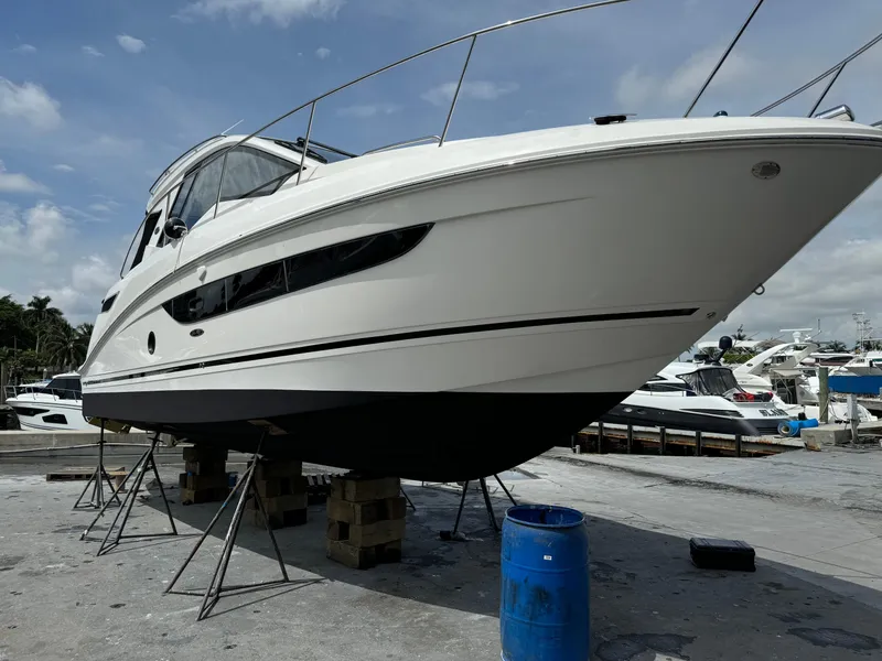 Slide: The Image of 2018 Sea Ray 350 DAC boat on dry dock, ready for maintenance. - 48