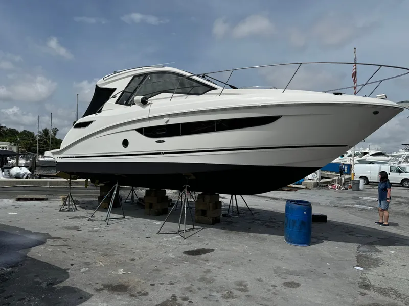 Slide: The Image of 2018 Sea Ray 350 DAC boat on dry dock, ready for maintenance. - 50