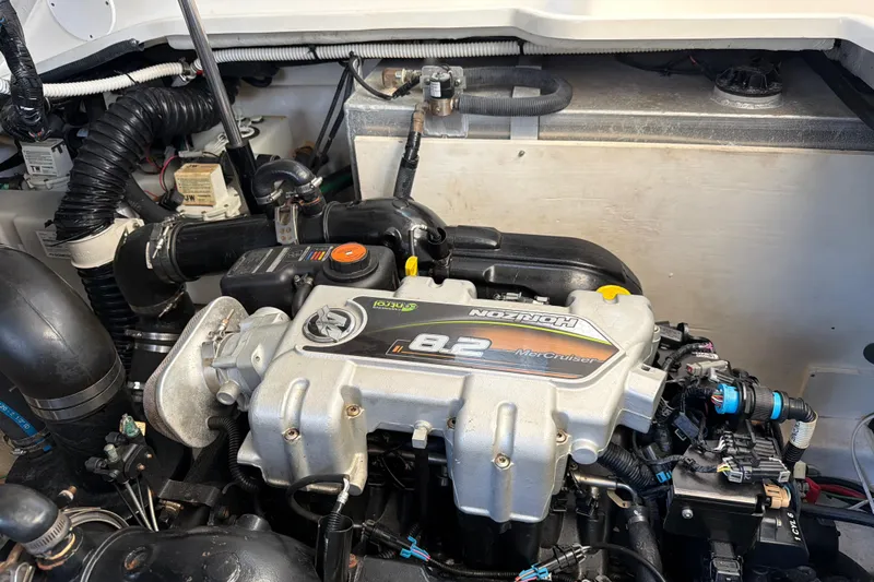 Slide: The Image of Engine compartment of a 2018 Sea Ray 350 Sundancer with MerCruiser 8.2 engine. - 54