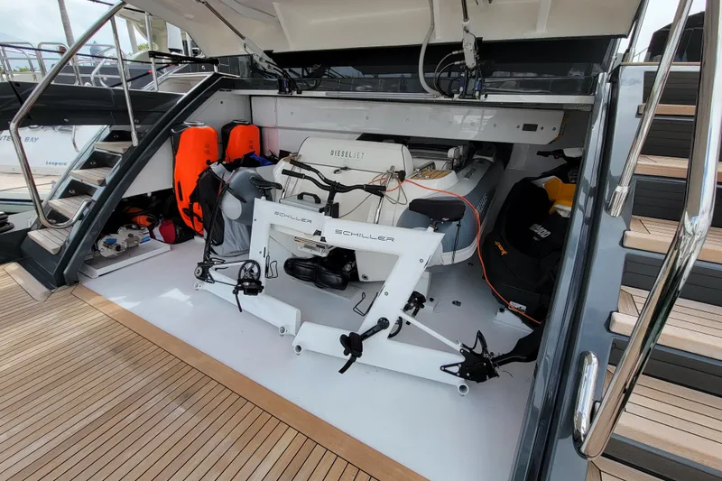 Slide: The Image of Luxurious interior of 2020 Mangusta 110 Open yacht with modern dining area and ocean views. - 14