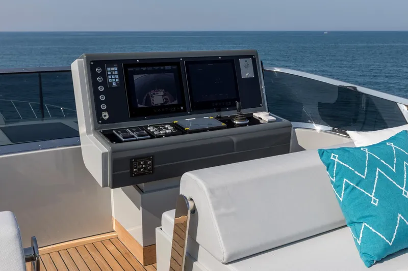 Slide: The Image of Luxurious interior of 2020 Mangusta 110 Open yacht with modern decor and ocean views. - 15