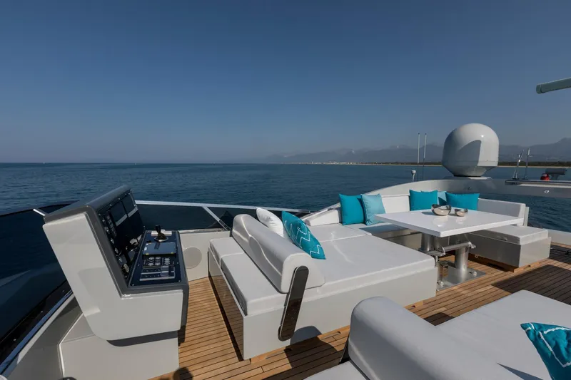 Slide: The Image of Luxurious bedroom interior on 2020 Mangusta 110 Open yacht, featuring modern design and ocean view. - 18