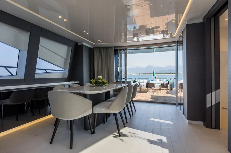 Slide: The Image of Luxurious twin cabin interior on 2020 Mangusta 110 Open yacht, featuring modern design and ambient lighting. - 24