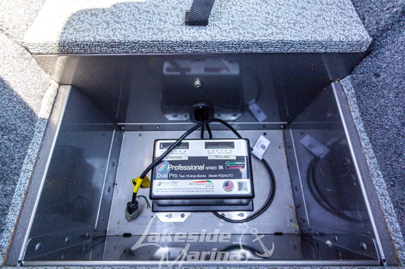 Slide: The Image of Battery compartment of 2016 Lund 1675 Impact XS SS boat with Dual Pro charger. - 27