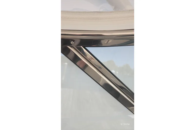 Slide: The Image of Close-up of 2017 Intrepid 475 Sport Yacht's sleek metallic frame detail. - 45