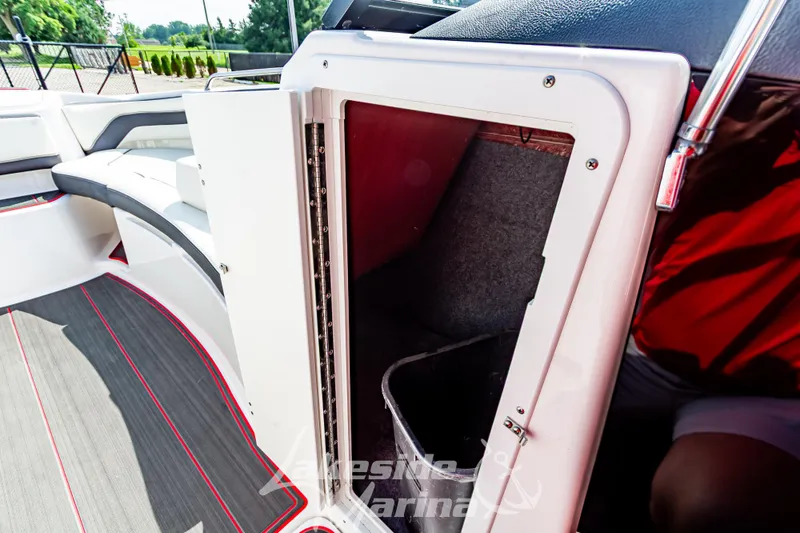 Slide: The Image of 2016 Yamaha Boats 242 Limited S E-Series interior storage compartment. - 34