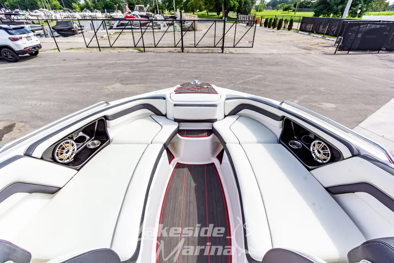 Slide: The Image of 2016 Yamaha Boats 242 Limited S E-Series interior with luxurious seating and speakers. - 35