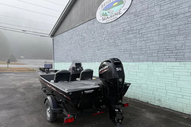 Slide: The Image of 2022 Bass Tracker Classic XL boat with Mercury 50 engine outside Water Marine building. - 11
