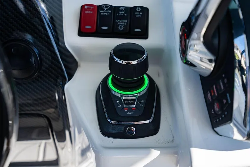 Slide: The Image of Control panel of 2024 HCB 42 Lujo boat with joystick and buttons. - 36