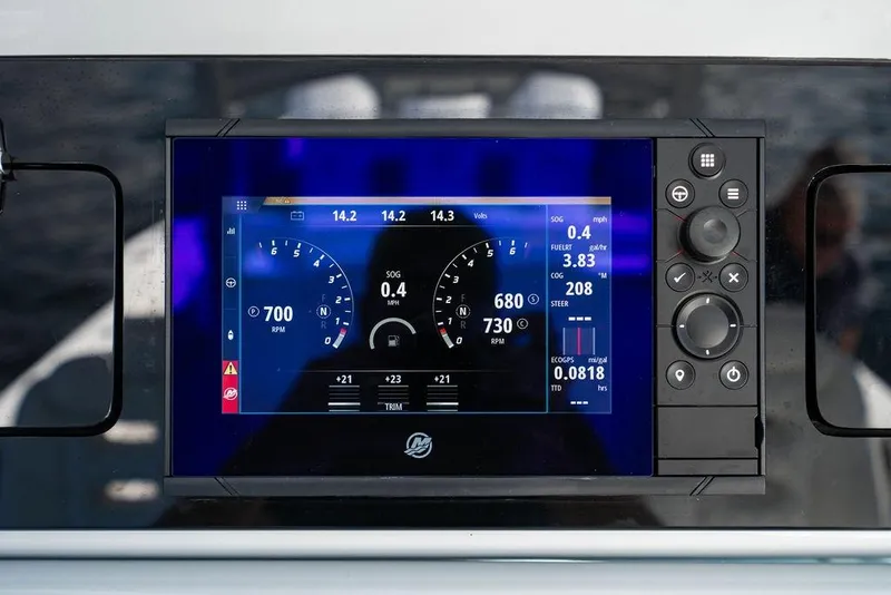 Slide: The Image of 2024 HCB 42 Lujo boat dashboard displaying digital gauges and controls. - 38