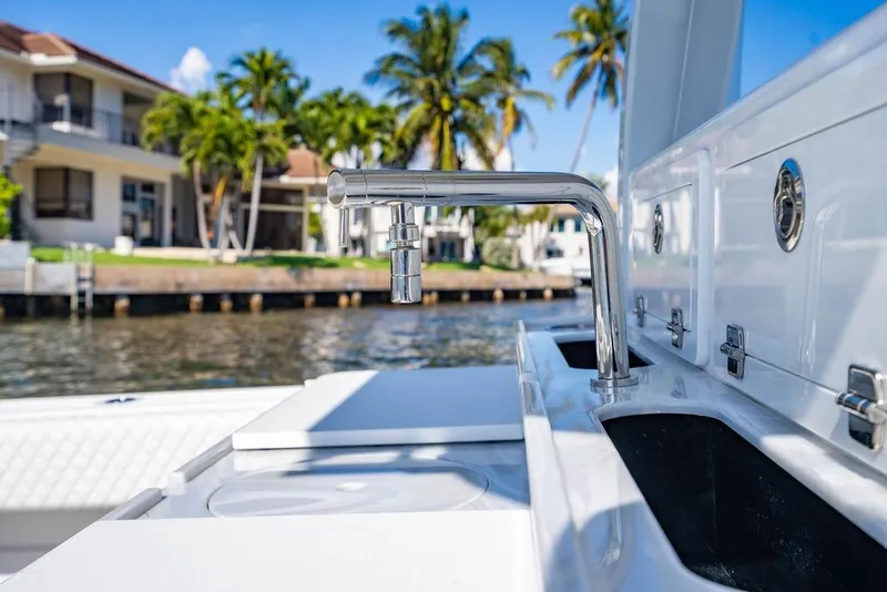 Slide: The Image of Luxury HCB 42 Lujo boat interior with sleek faucet, 2024 model, dockside view. - 55