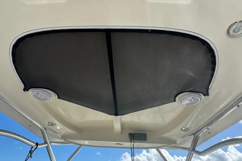 Slide: The Image of 2011 Hydra-Sports 3000 VX boat canopy with speakers and clear sky background. - 20