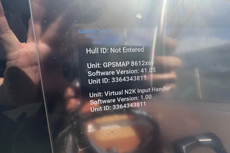 Slide: The Image of Garmin device display on 2011 Hydra-Sports 3000 VX, showing software versions and unit IDs. - 35