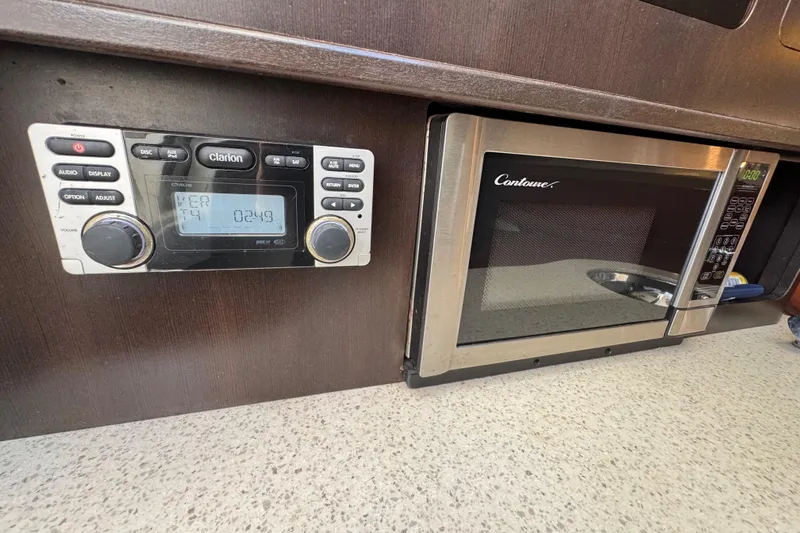 Slide: The Image of 2011 Hydra-Sports 3000 VX interior with Clarion stereo and Contoure microwave. - 52