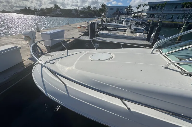 Slide: The Image of 2011 Hydra-Sports 3000 VX boat docked at marina, sunny day, calm waters. - 6