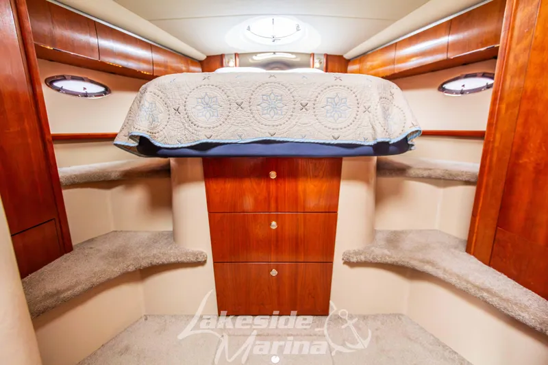 Slide: The Image of Luxurious 2006 Cruisers Yachts 420 Express cabin interior with elegant wood finish. - 122