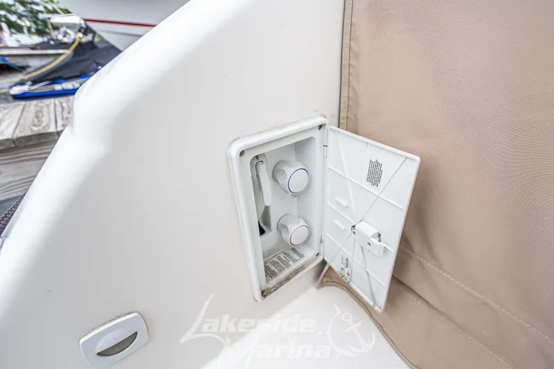 Slide: The Image of Access panel on a 2006 Cruisers Yachts 420 Express, showing water controls. - 26