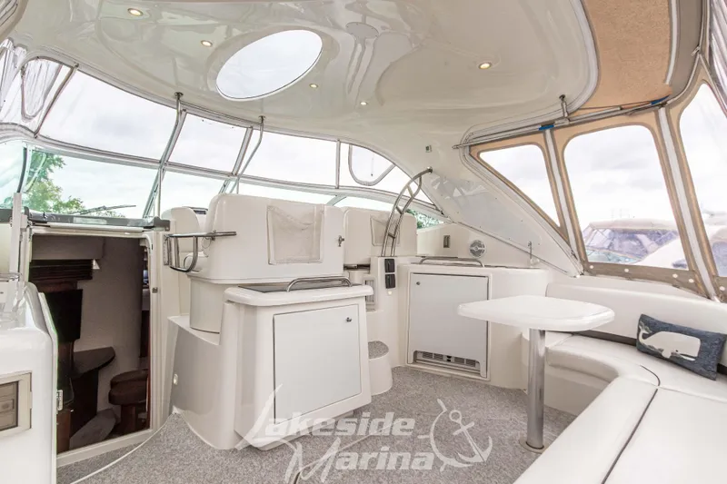 Slide: The Image of 2006 Cruisers Yachts 420 Express interior with modern seating and sleek design. - 27