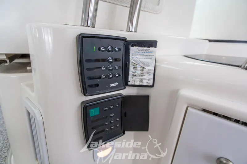 Slide: The Image of Control panel on 2006 Cruisers Yachts 420 Express, featuring SMXir system. - 35