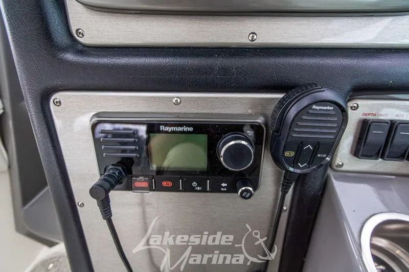 Slide: The Image of Raymarine marine radio system on 2006 Cruisers Yachts 420 Express dashboard. - 48