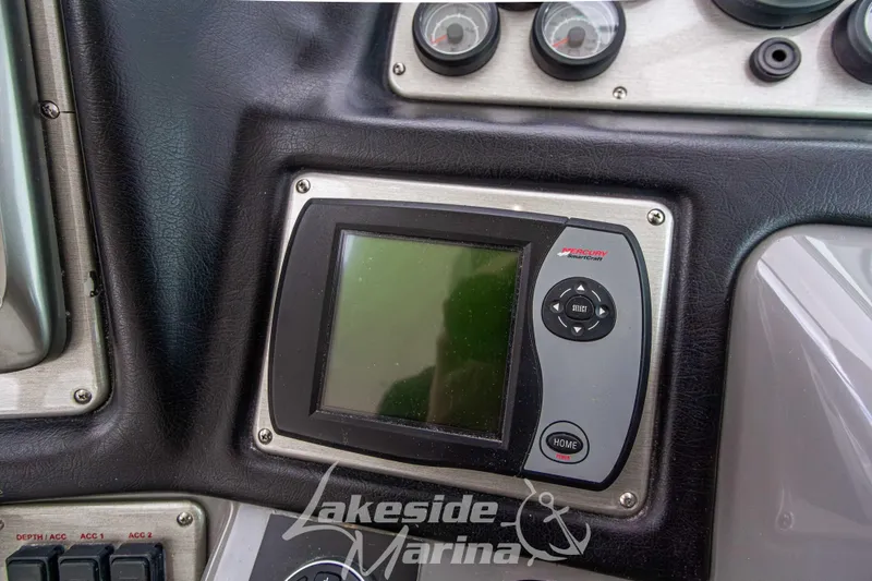 Slide: The Image of Control panel of a 2006 Cruisers Yachts 420 Express with Mercury SmartCraft display. - 50