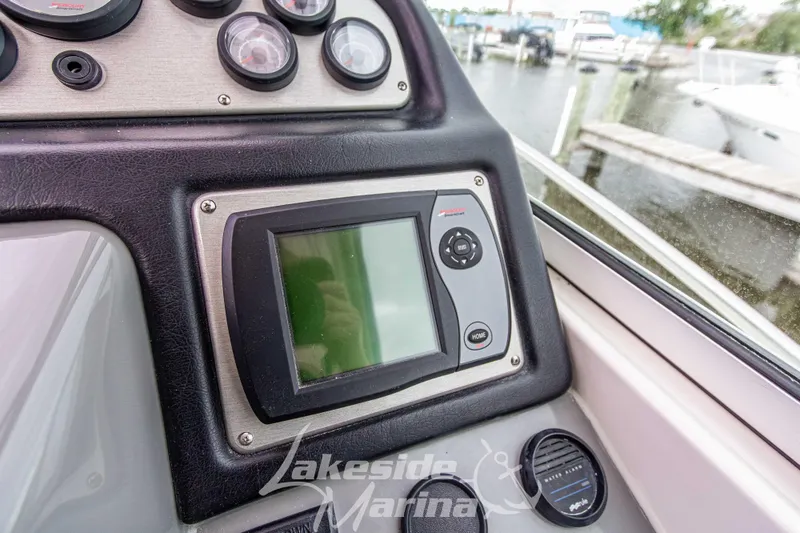 Slide: The Image of 2006 Cruisers Yachts 420 Express dashboard with navigation system at Lakeside Marina. - 51
