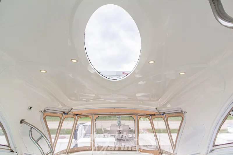 Slide: The Image of Interior view of 2006 Cruisers Yachts 420 Express with skylight and modern design. - 68