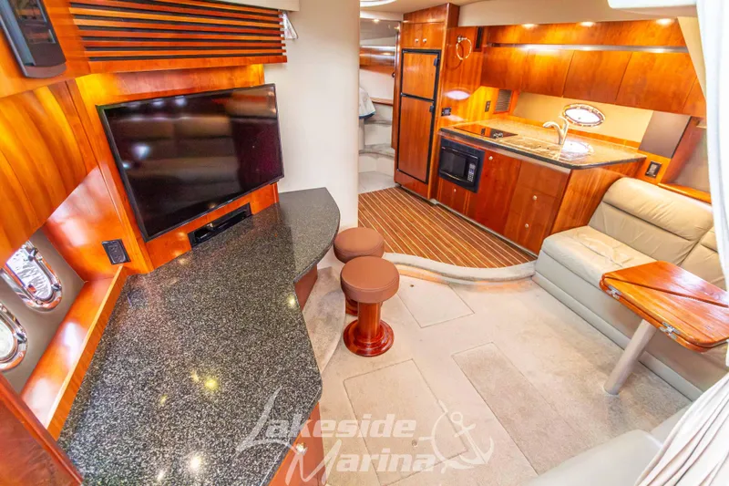 Slide: The Image of Luxurious interior of 2006 Cruisers Yachts 420 Express with modern amenities and elegant design. - 70