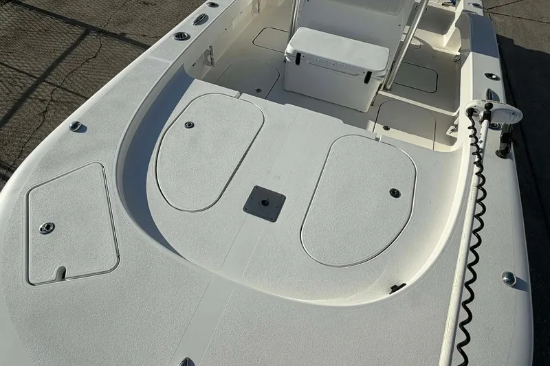 Slide: The Image of 2020 Tideline 235 Hybrid boat deck with storage compartments and seating. - 11