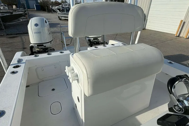 Slide: The Image of 2020 Tideline 235 Hybrid boat interior with dual Suzuki 200 engines. - 12