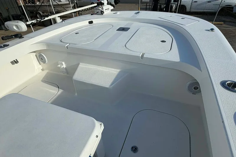 Slide: The Image of 2020 Tideline 235 Hybrid boat interior with storage compartments and seating. - 26