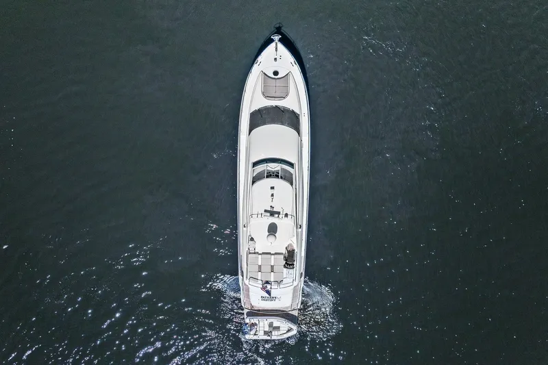 Slide: The Image of Aerial view of a Lazzara yacht cruising on calm waters. - 10