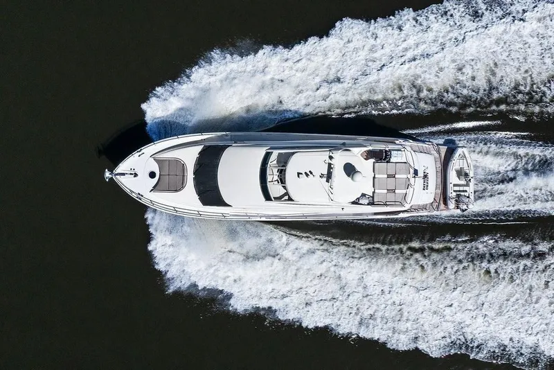 Slide: The Image of Aerial view of a 2005 Lazzara 68 Flybridge yacht on the water. - 11