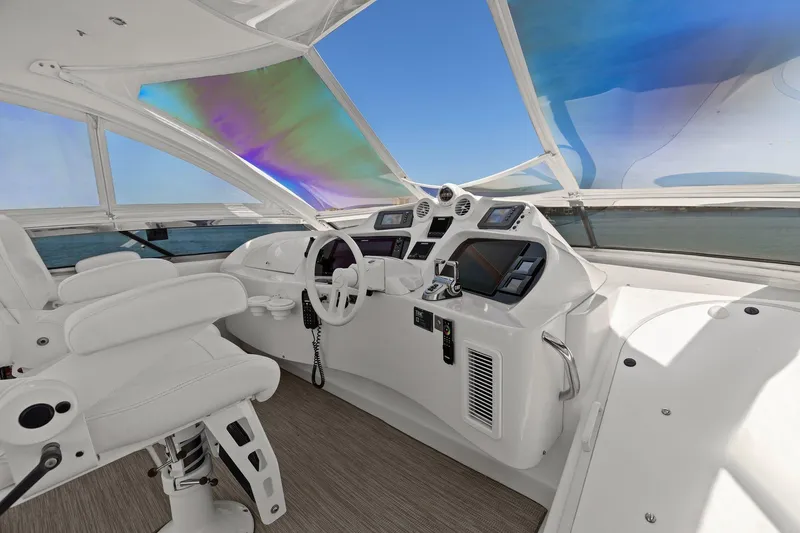 Slide: The Image of Luxurious Lazzara yacht helm with modern controls and panoramic ocean view. - 38