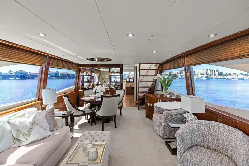 Slide: The Image of Luxurious Lazzara yacht interior with elegant seating, dining area, and panoramic water views. - 42