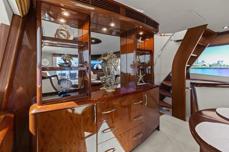 Slide: The Image of Luxurious Lazzara yacht interior with elegant wooden cabinetry and decorative accents. - 55