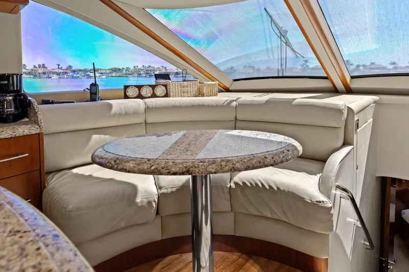 Slide: The Image of Luxurious Lazzara yacht interior with plush seating and panoramic windows. - 57
