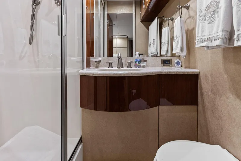 Slide: The Image of Luxurious Lazzara yacht bathroom with elegant fixtures and modern design. - 84