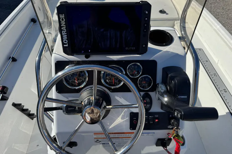 Slide: The Image of 2023 G3 Bay 17 boat dashboard with Lowrance Elite display and Yamaha controls. - 14