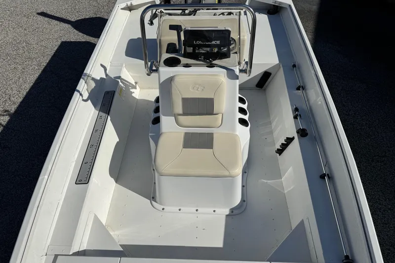 Slide: The Image of 2023 G3 Bay 17 boat interior with seating and console, top view. - 9