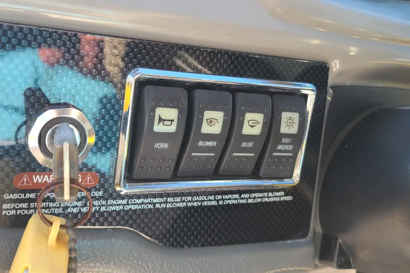 Slide: The Image of Control panel of a 2017 Chaparral Vortex 203 VRX boat with key ignition. - 10