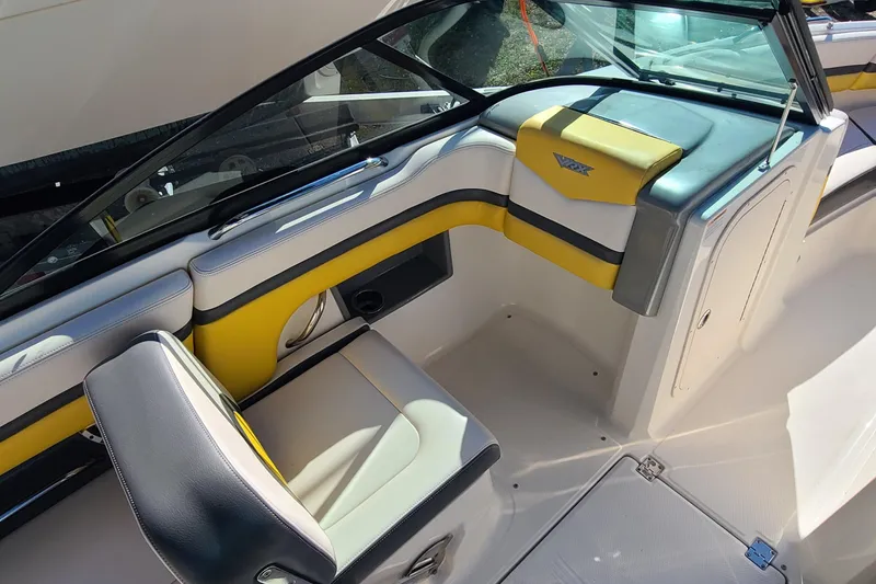 Slide: The Image of 2017 Chaparral Vortex 203 VRX boat interior with yellow and gray seating. - 11